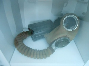 Gas mask of ww2 period and hose from similar found on Lochgarry